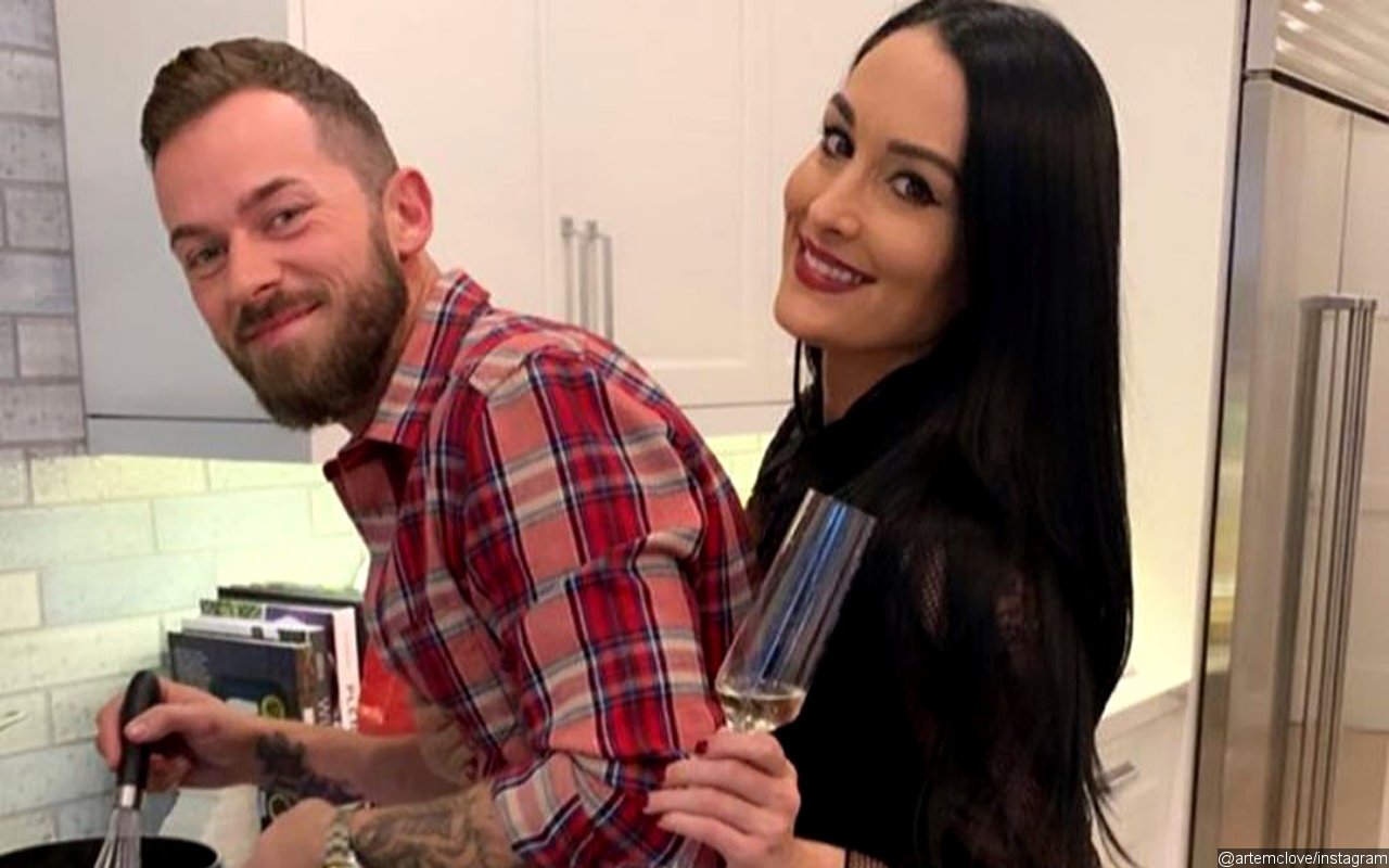 Nikki Bella and Artem Chigvintsev Plan to Go to Couples Therapy Due to 'Many Ups and Downs'