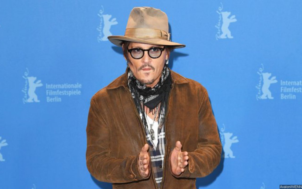 Johnny Depp Accepts Award Behind Bars in Bizarre Photo After Losing Libel Suit