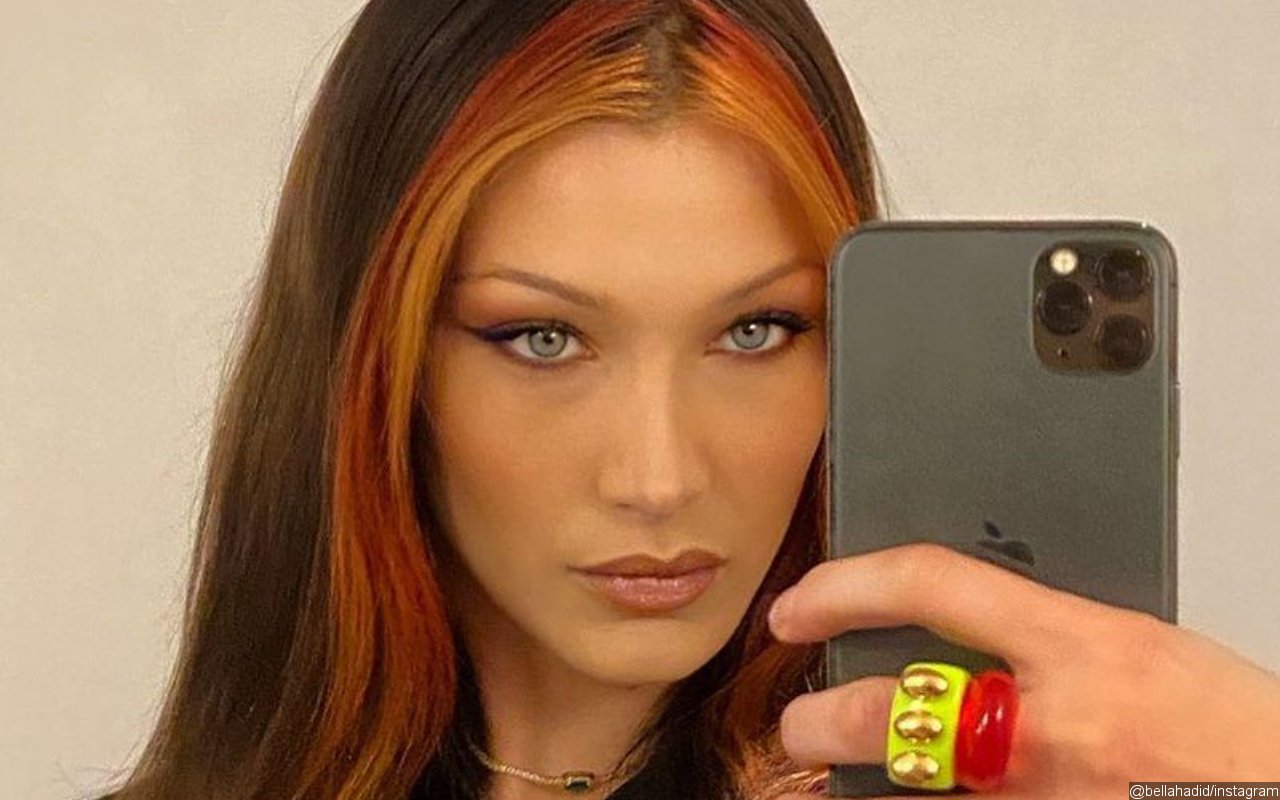 Bella Hadid Jumps on the Trend With Fiery Hair Makeover