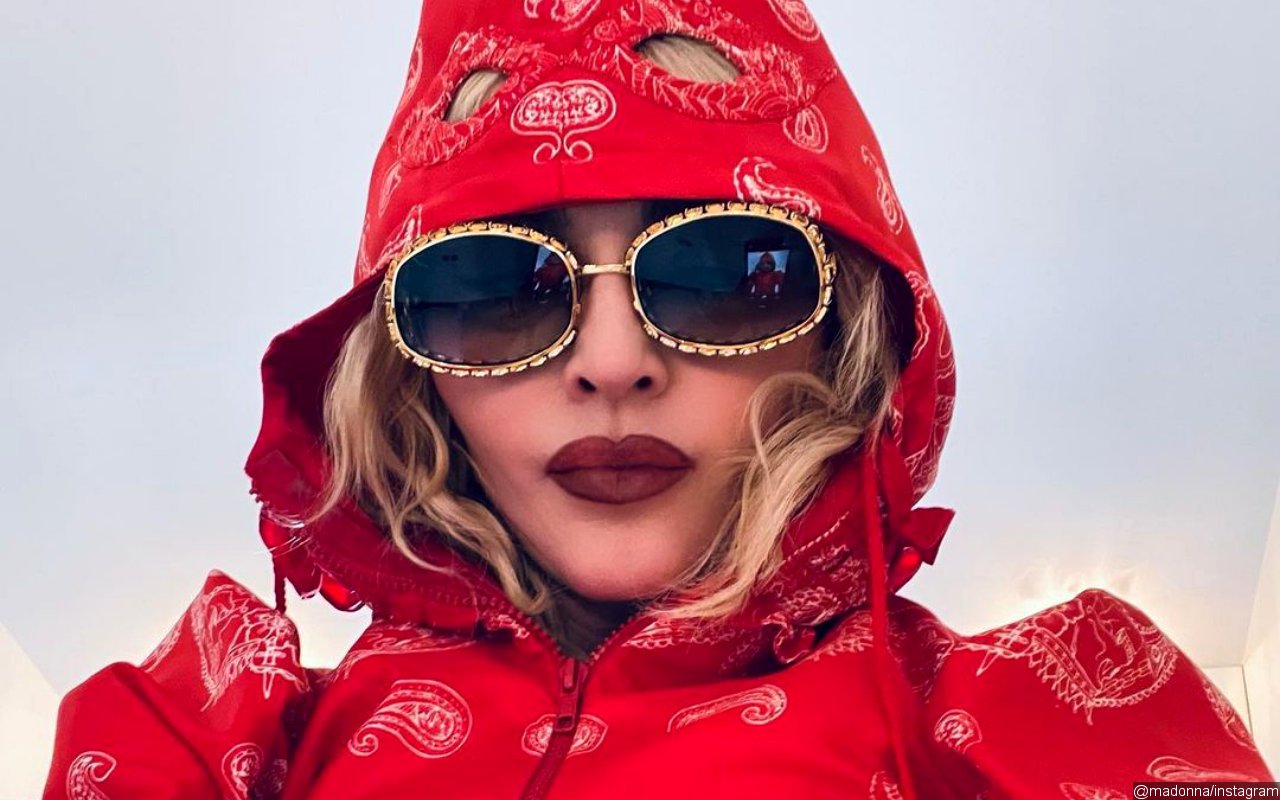 Madonna Faces Backlash for Allegedly Photoshopping Face Onto Another