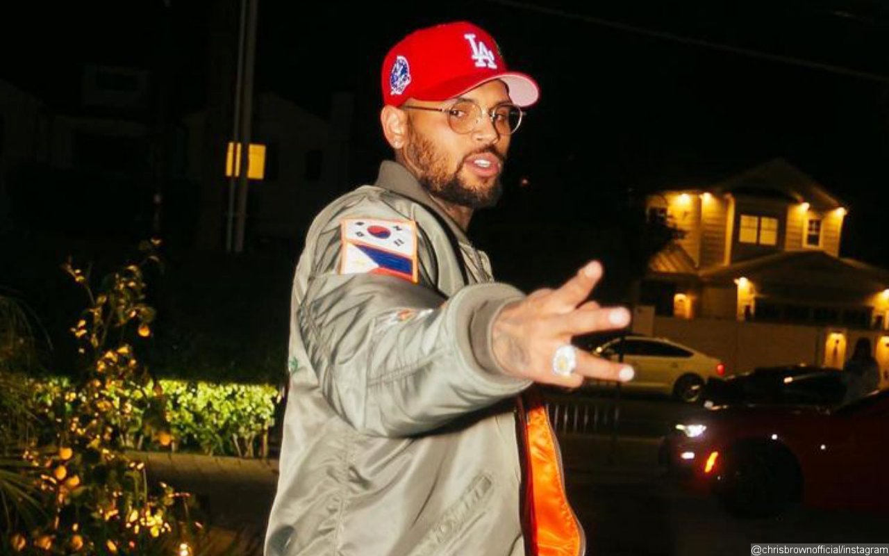 Chris Brown Looks Calm After His Porsche's Damaged in Valet Crash