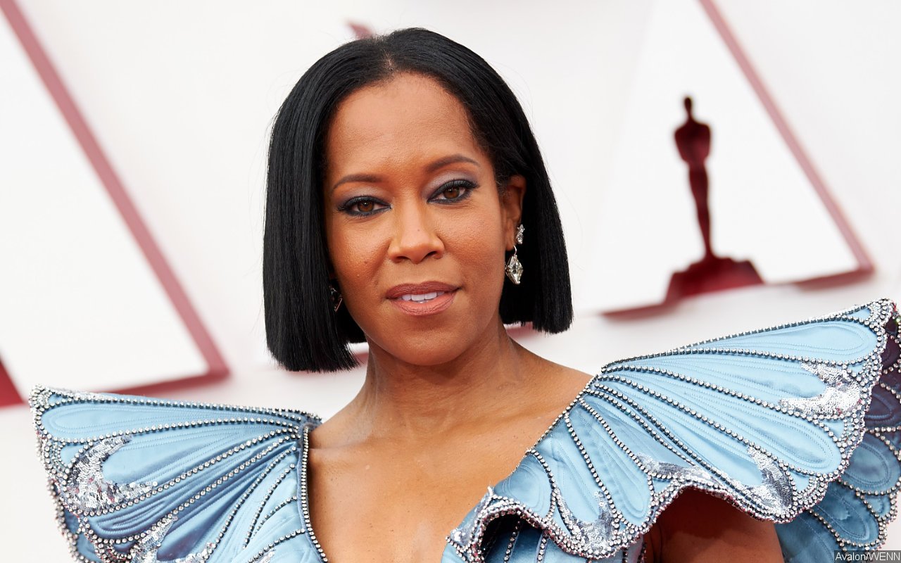 Regina King Acts Like a Pro After Almost Tripping During Oscars Opening