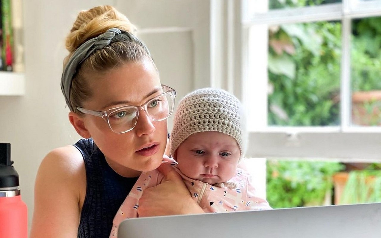 Amber Heard Proudly Embraces Double Duty as 'Mom and Dad' to Baby Daughter