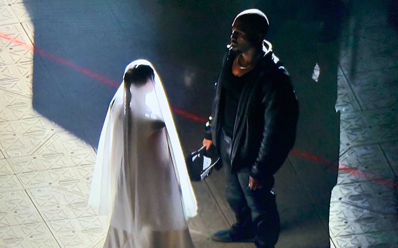 Kim Kardashian Baffles Fans by Showing Up in Wedding Dress at Kanye West's 'Donda' Event