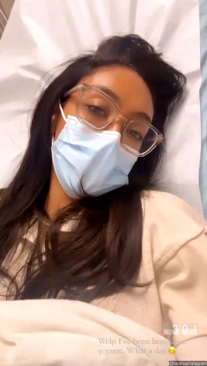 Tayshia Adam shared a picture from a hospital bed after marathon