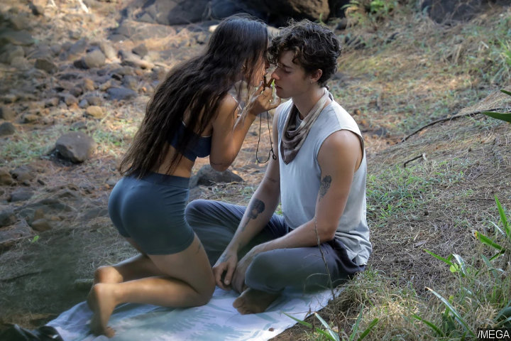 Shawn Mendes and Yogi Hitomi Mochizuki Performing Beach Ritual
