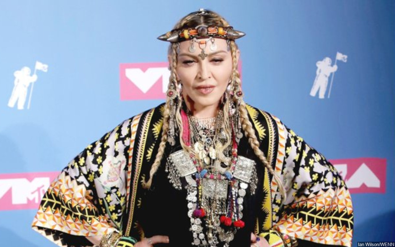 Madonna Gives Middle Fingers After Trolls Criticize Her for Looking Like Teenager in Photos - Vimarsana News