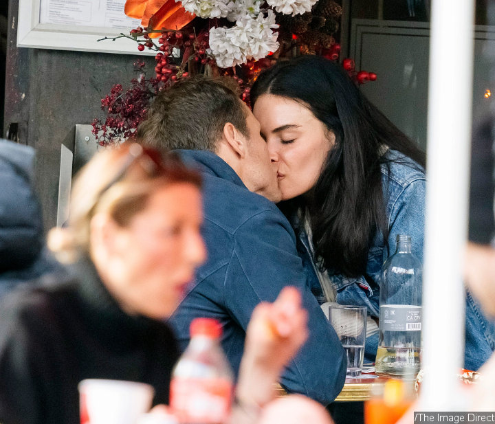 Sam Heughan Kissing a Mystery Woman