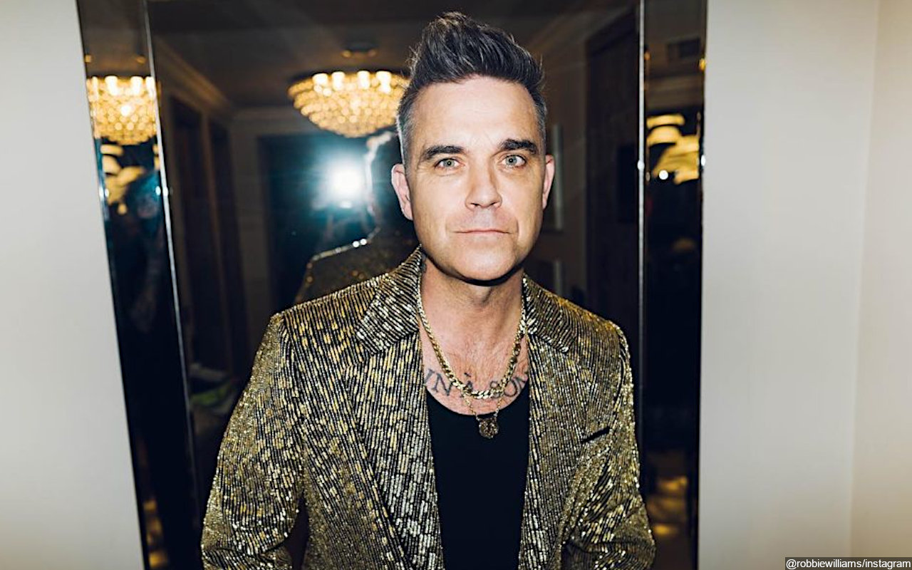 Robbie Williams Says He Doesn't 'Condone' Some Sex Scenes in His Biopic 'Better Man' 