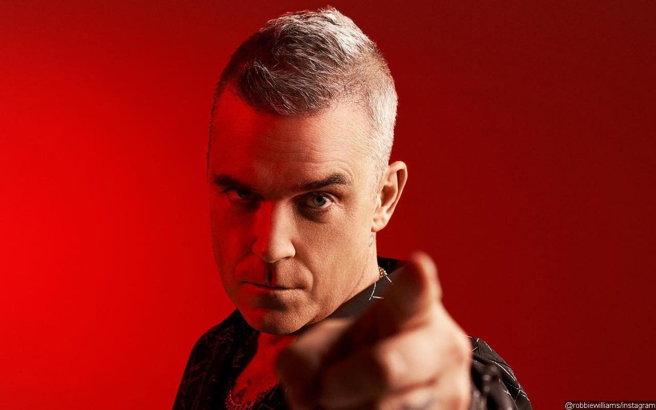 Robbie Williams Jokingly Calls Himself 'Hollywood W*****' Over 'Better Man' Promotion