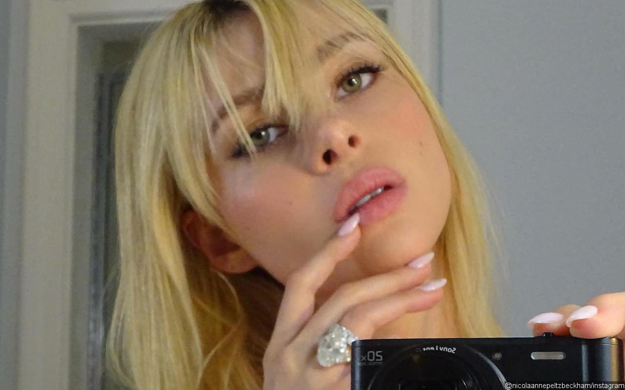 Nicola Peltz Shows Off Diamond Wedding Ring in New Selfies