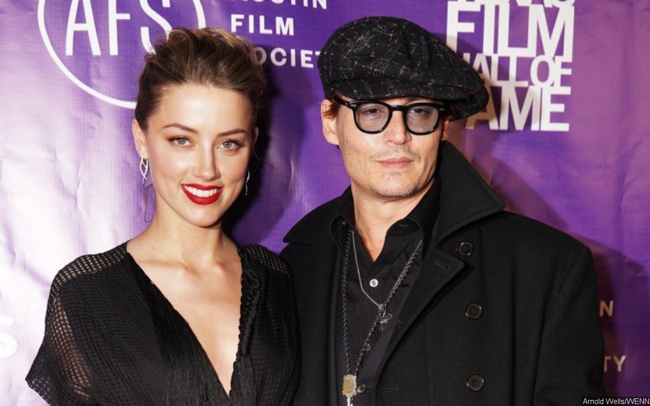 Amber Heard Says Image of Johnny Depp With Black Eyes 'Is Photoshopped'