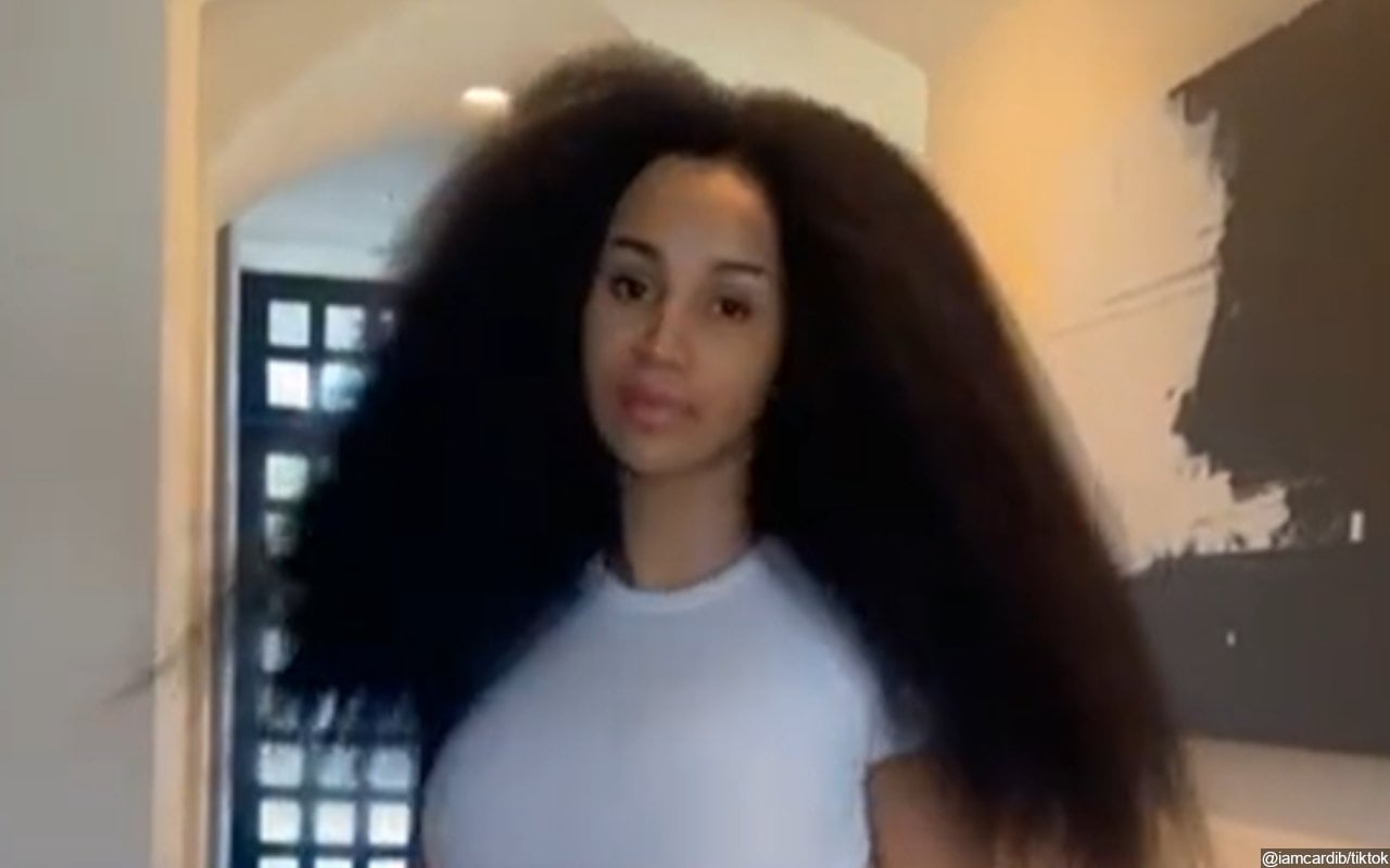 Cardi B Earns Praises After Flaunting Her Long, Natural Hair in New TikTok Video 