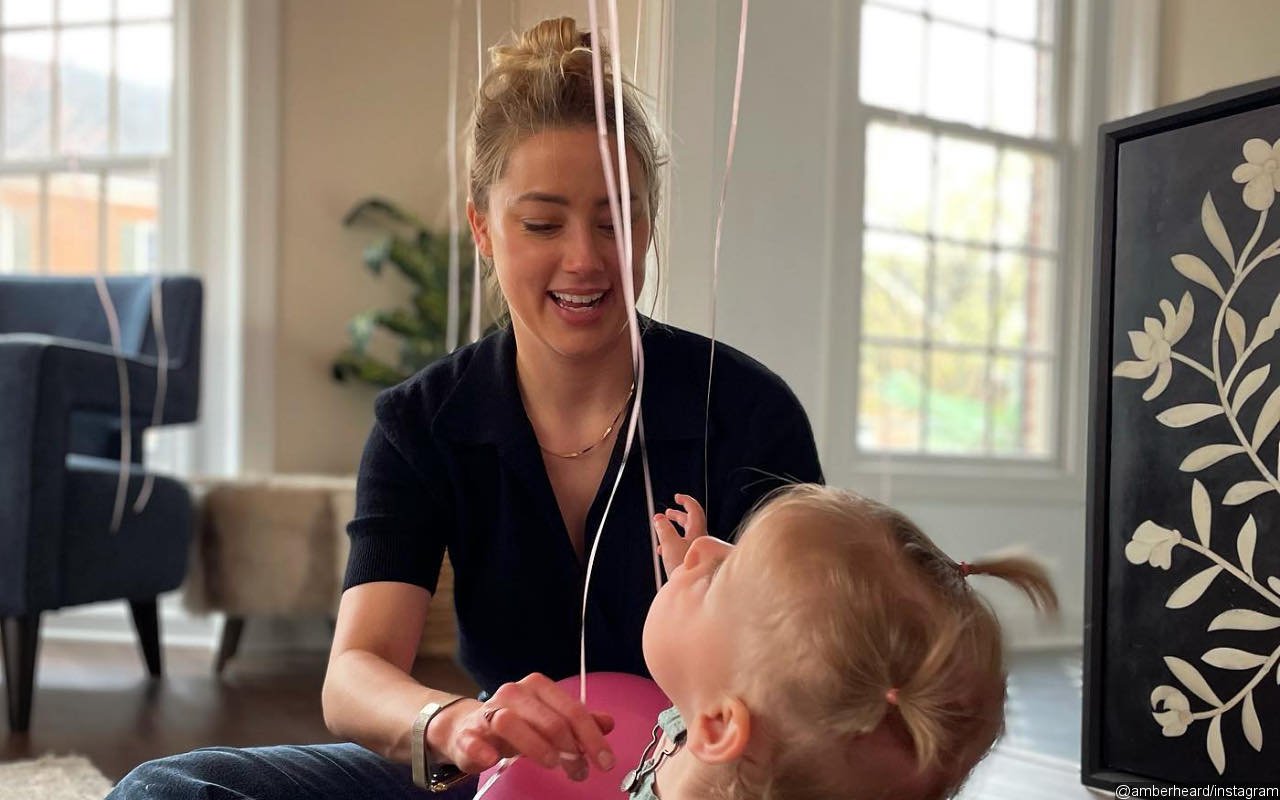 Twitter Wonders If Amber Heard's Daughter Is Real as the Baby 'Keeps Changing Sizes'
