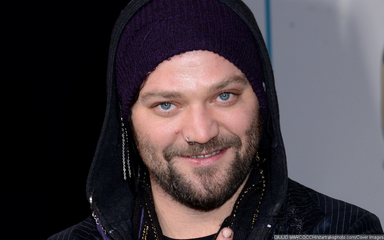 Bam Margera Poses With Sexy Ladies photo