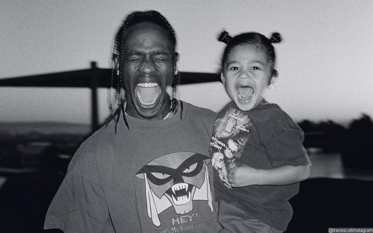 Travis Scott All Smiles During Father-Daughter Day With Stormi at Universal Studios Hollywood