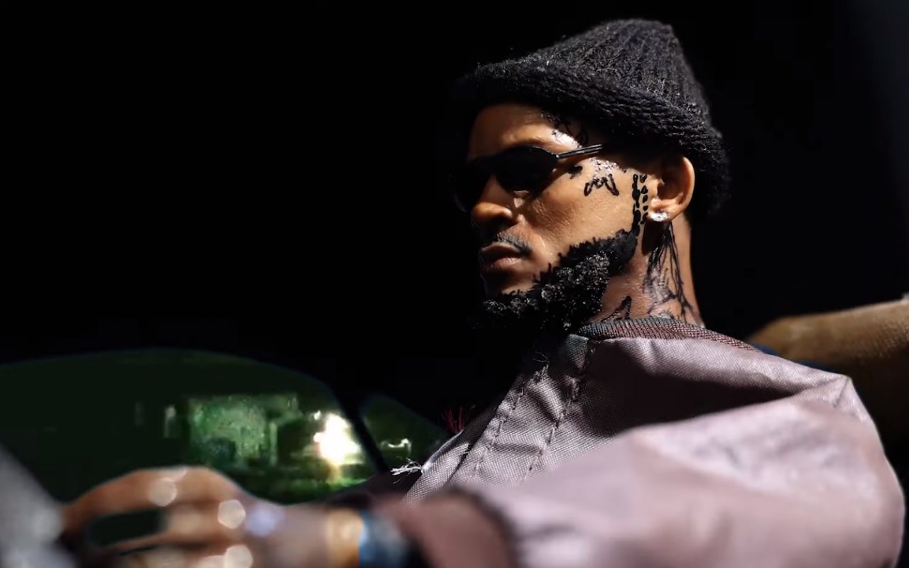 Tory Lanez Action Figure in 'Sorry 4 What? // LV BELT' Music Video