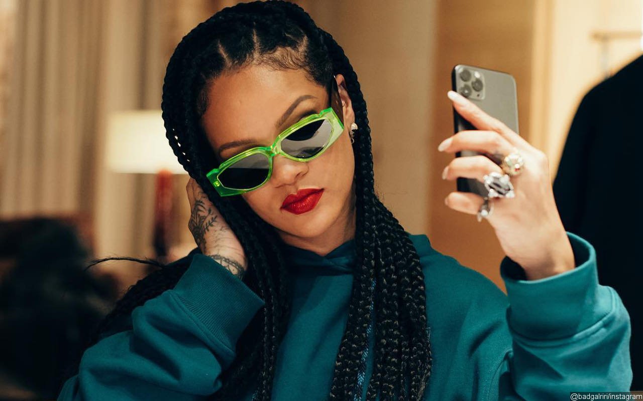 Rihanna Possibly Hints at Her Baby #39 s Name With Her Necklace