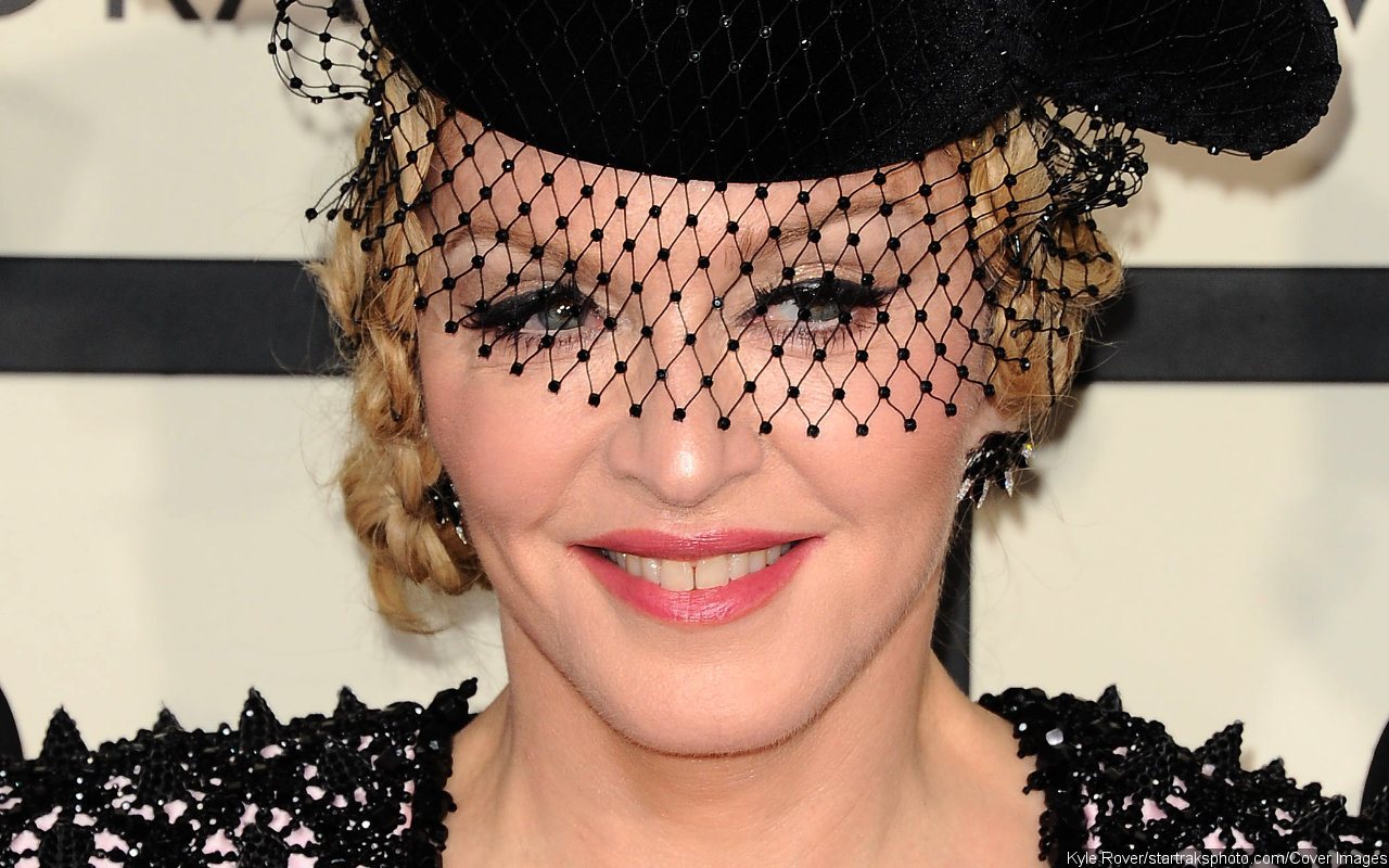Madonna Flashes Nipple in Risque Video After Begging Trolls to 'Stop Bullying' Her