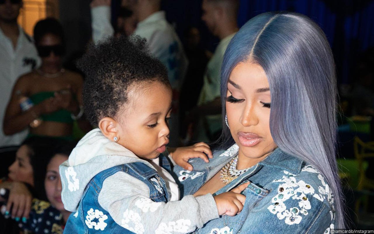 Cardi B Posts Adorable Video of Son Wave Running Around Huge Christmas Trees at Home
