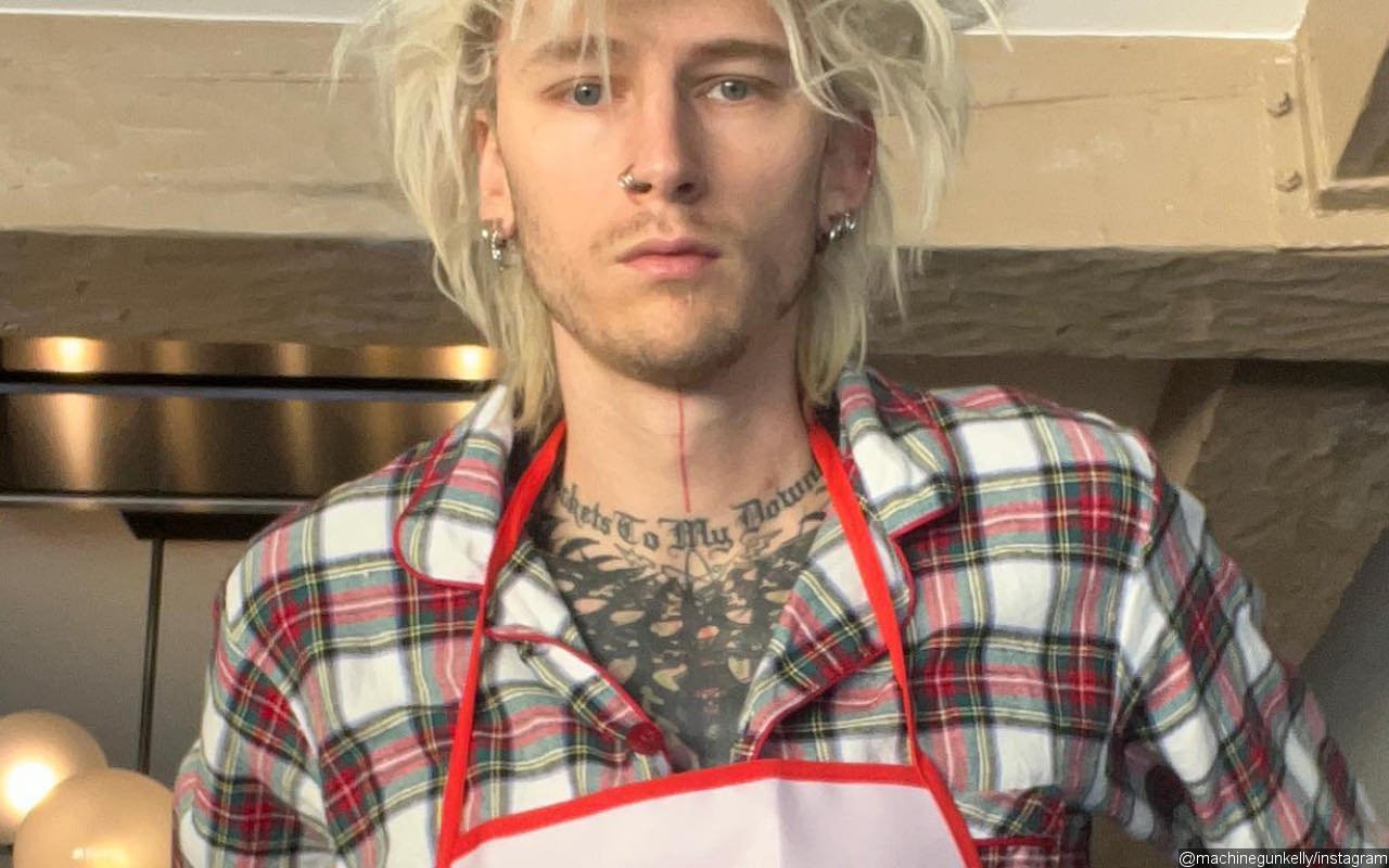 Machine Gun Kelly Gets Bitter Responses Over Clip of Him Wearing Cleavage-Baring Christmas Apron