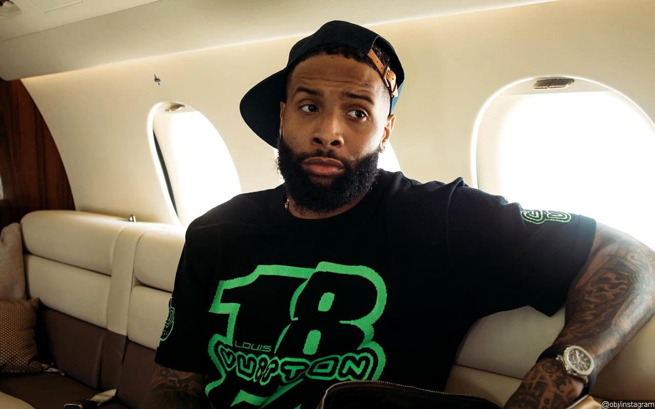 Odell Beckham Jr. Seen Hurling Abuse at Passenger While Being Escorted