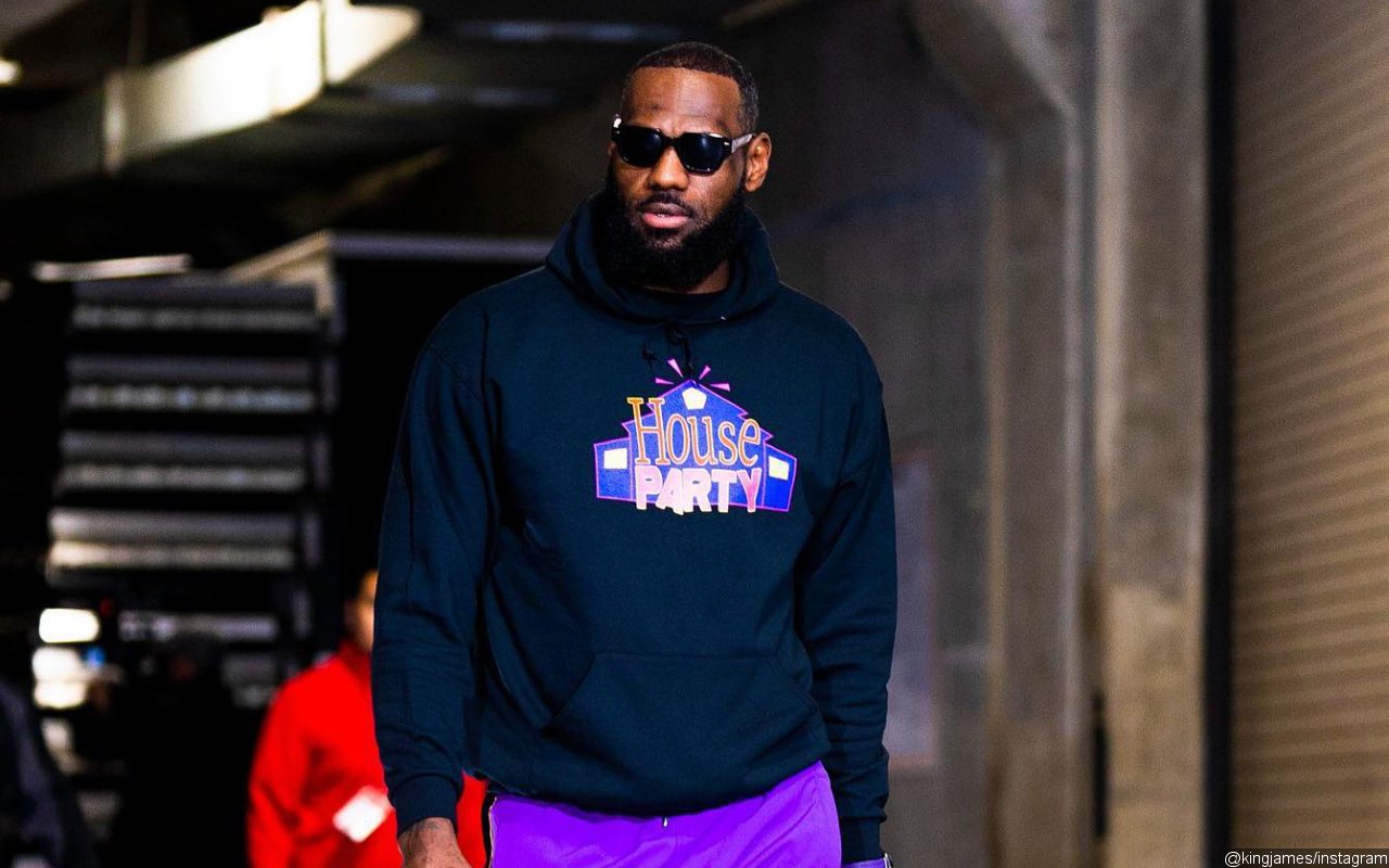 LeBron James Being Held Back From Confronting Heckler in Viral Video