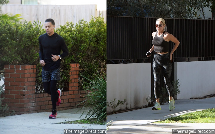 T.J. Holmes and Amy Robach Jogging