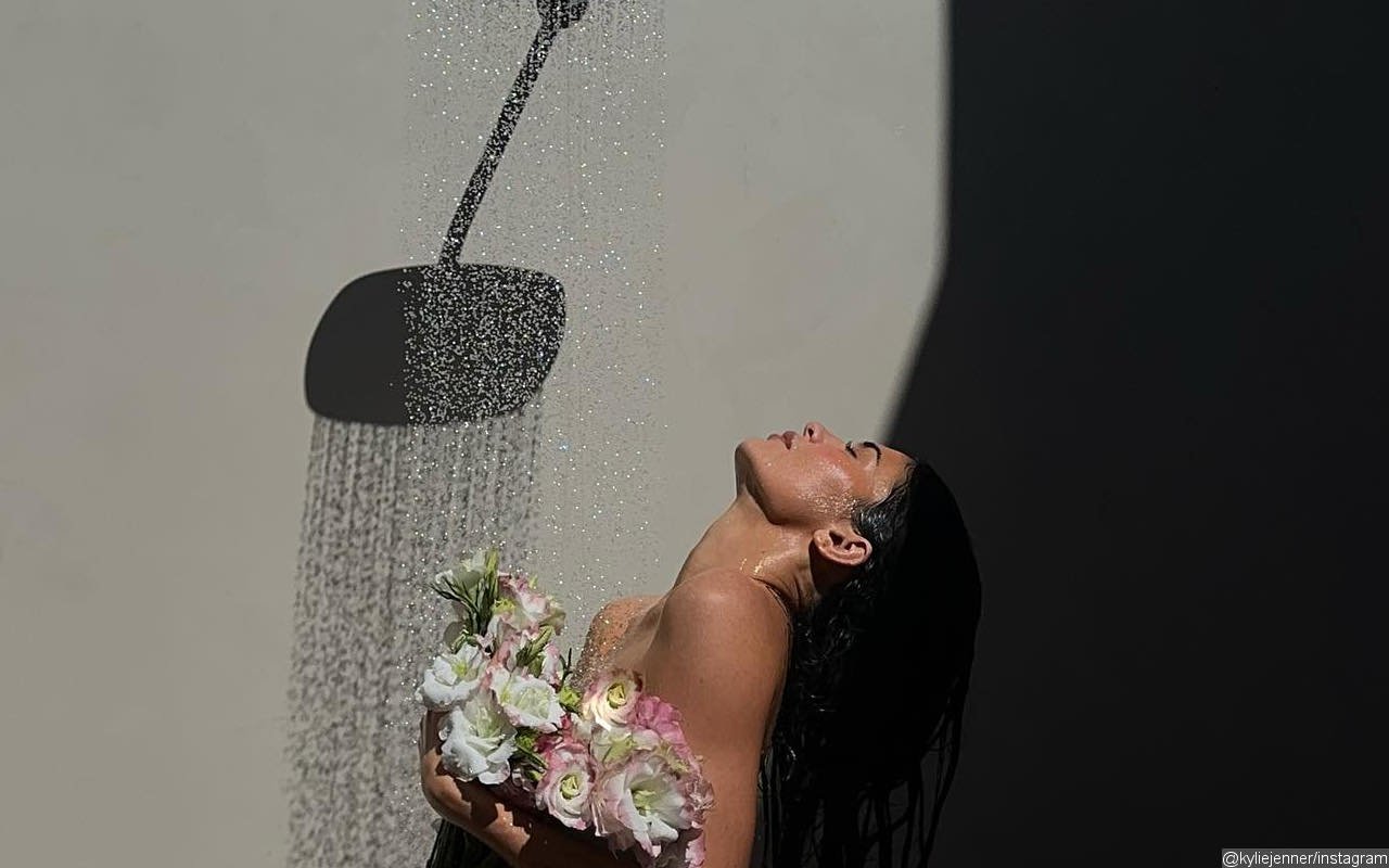 Kylie Jenner Covers Her Body With Flowers in Naked Shower Photo