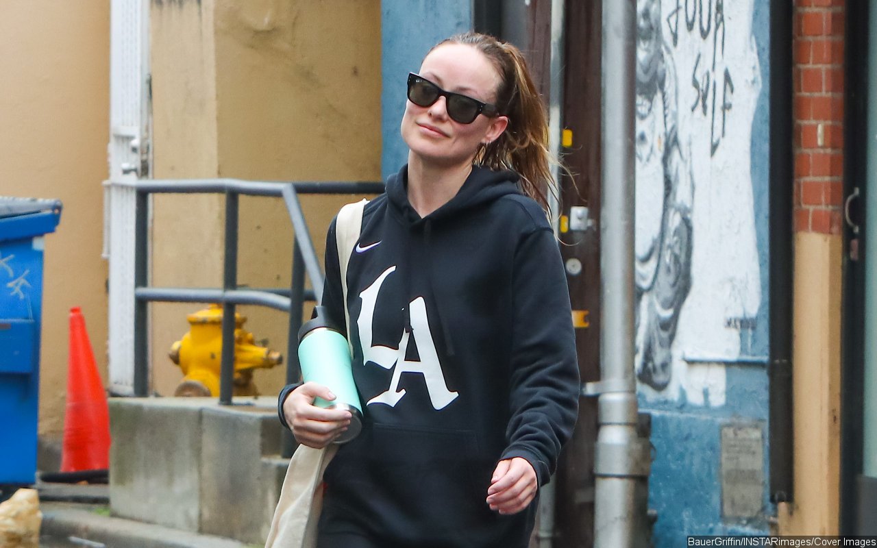 Olivia Wilde Labeled 'Attention Seeker' After Bizarrely Stretching Legs in Public