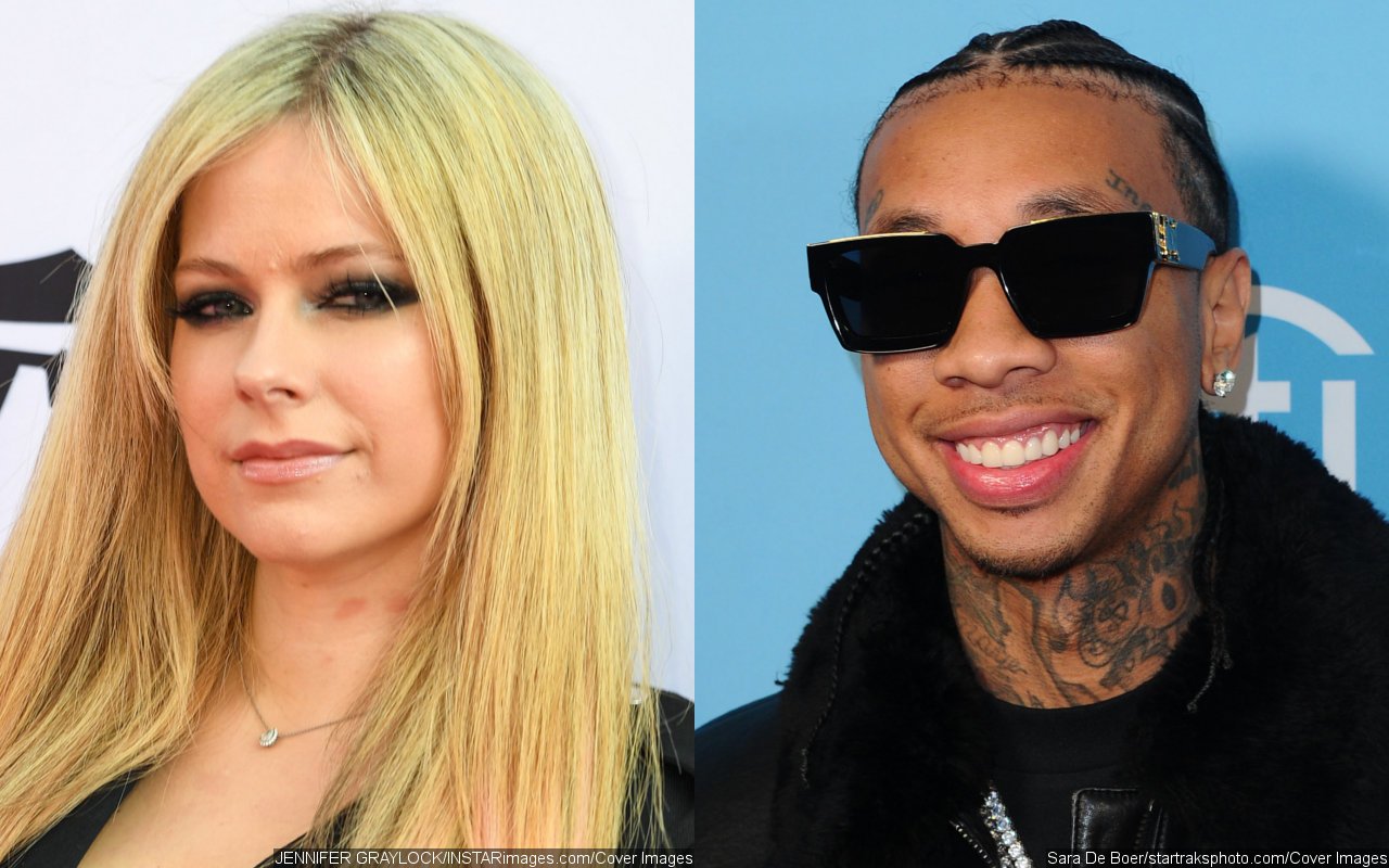 Avril Lavigne and Tyga Confirm Romance With a Kiss in Paris