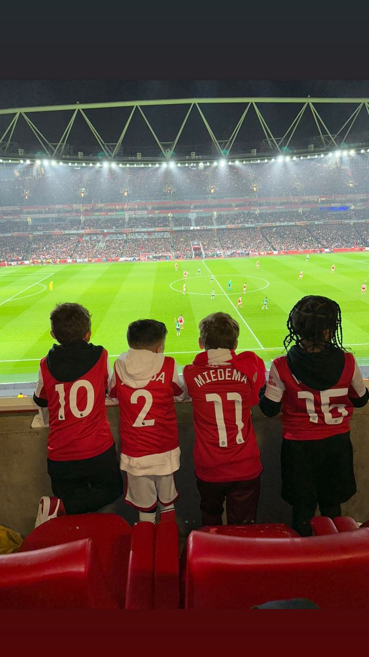 Saint West and his pals are watching soccer game