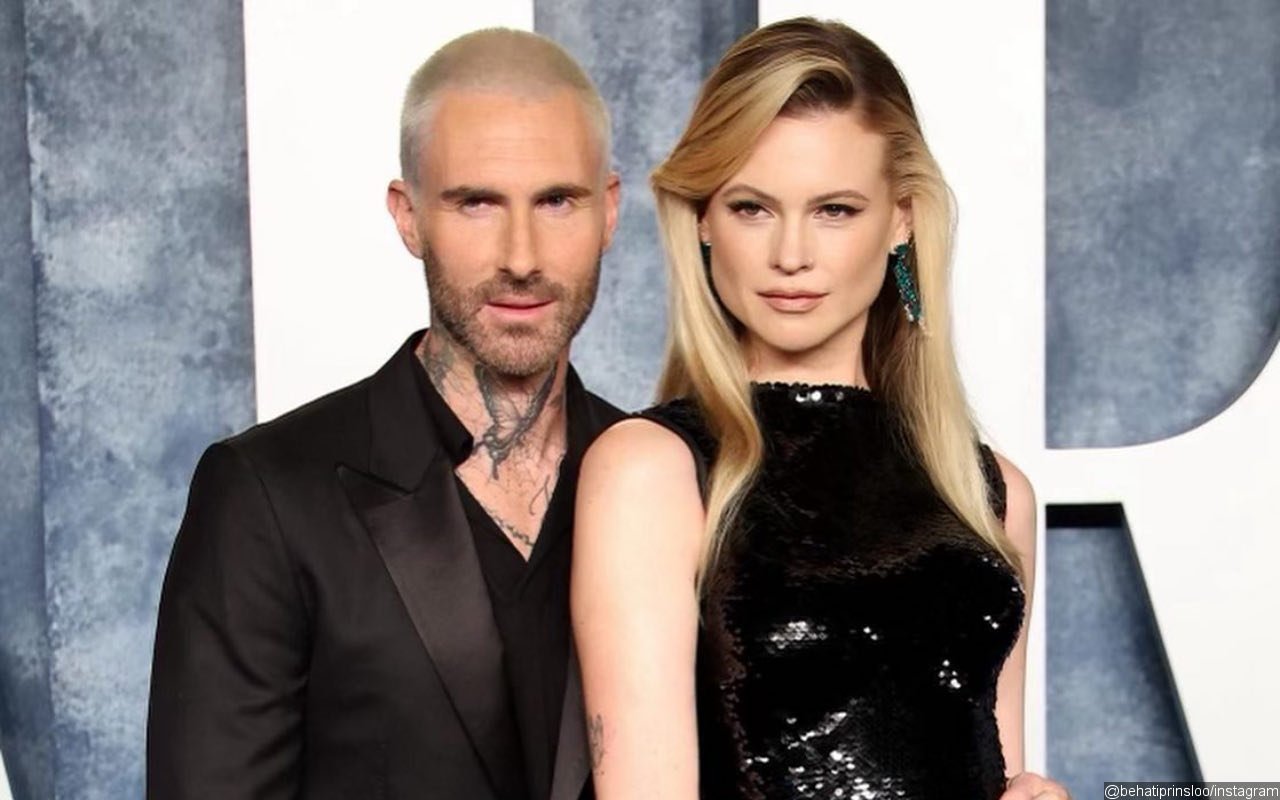 Behati Prinsloo Showers Adam Levine With Kisses at Disneyland on His ...