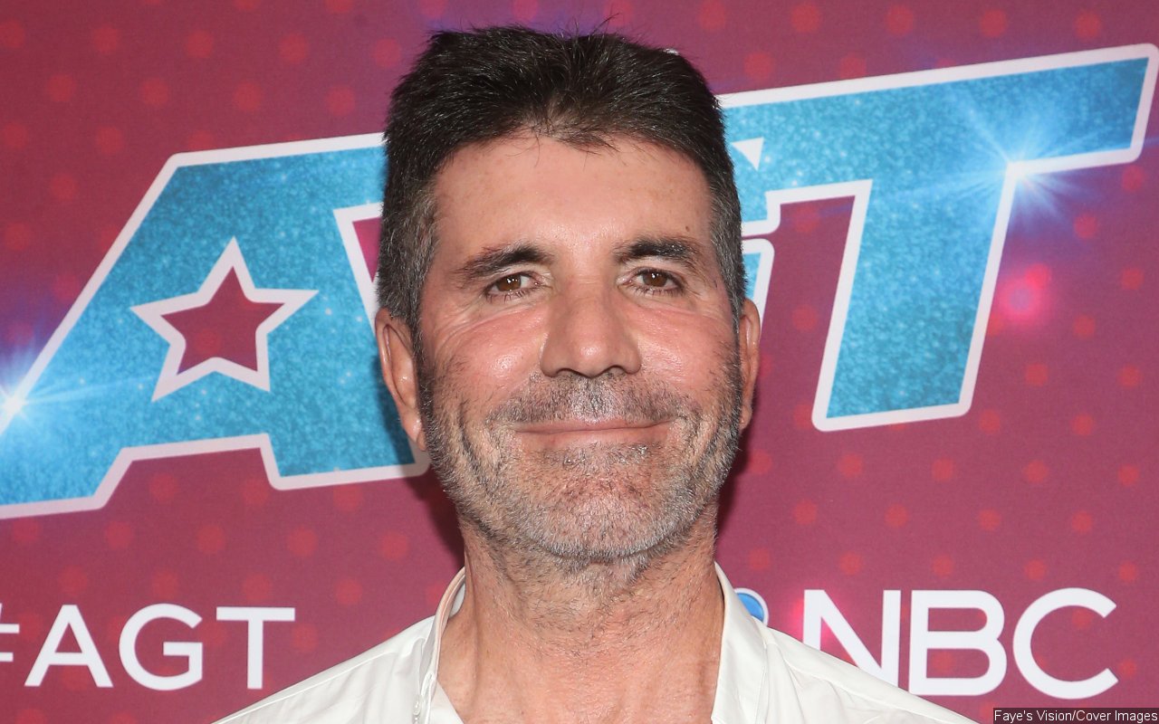 Simon Cowell Wears Surgical Back Brace Two Years After E-Bike Accident