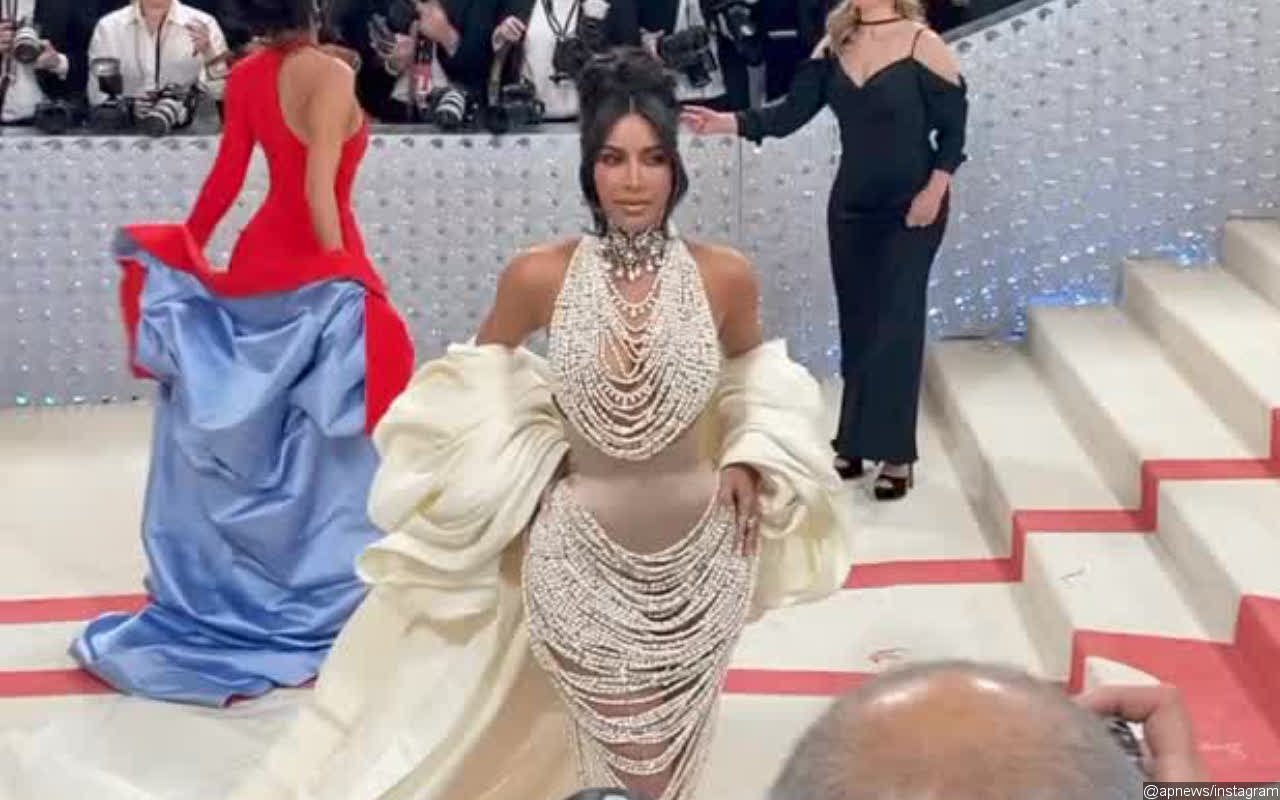 Kim Kardashian Is Draped in Pearls, Brings Daughter North West to Met Gala