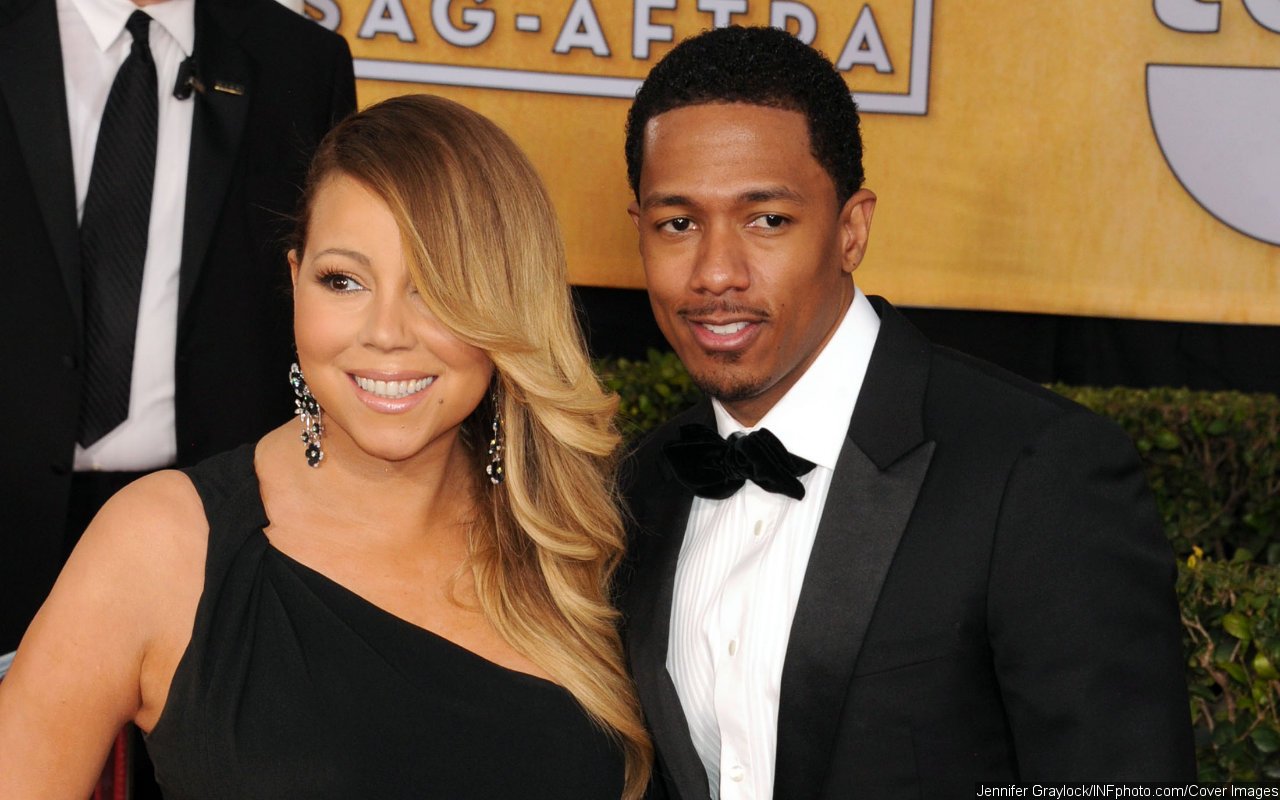 Nick Cannon Likens His and Mariah Carey's Marriage to Trump and Putin Living in the Same House