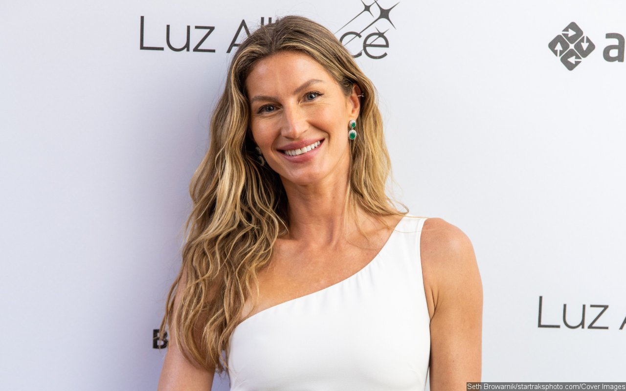 Gisele Bundchen Enjoys Paddleboarding in Bikini With Her Jiu-Jitsu Instructor