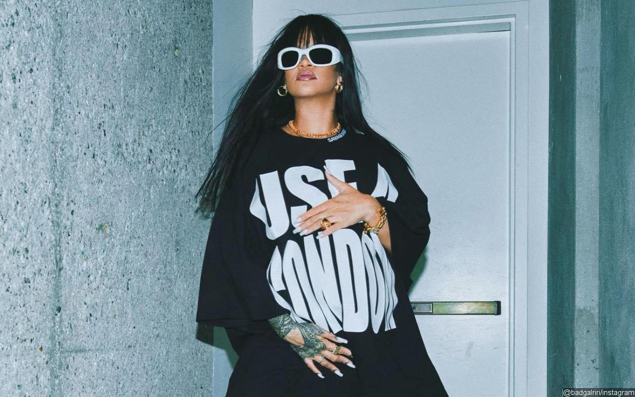 Pregnant Rihanna Advocates Use of Condom With Cheeky T-Shirt