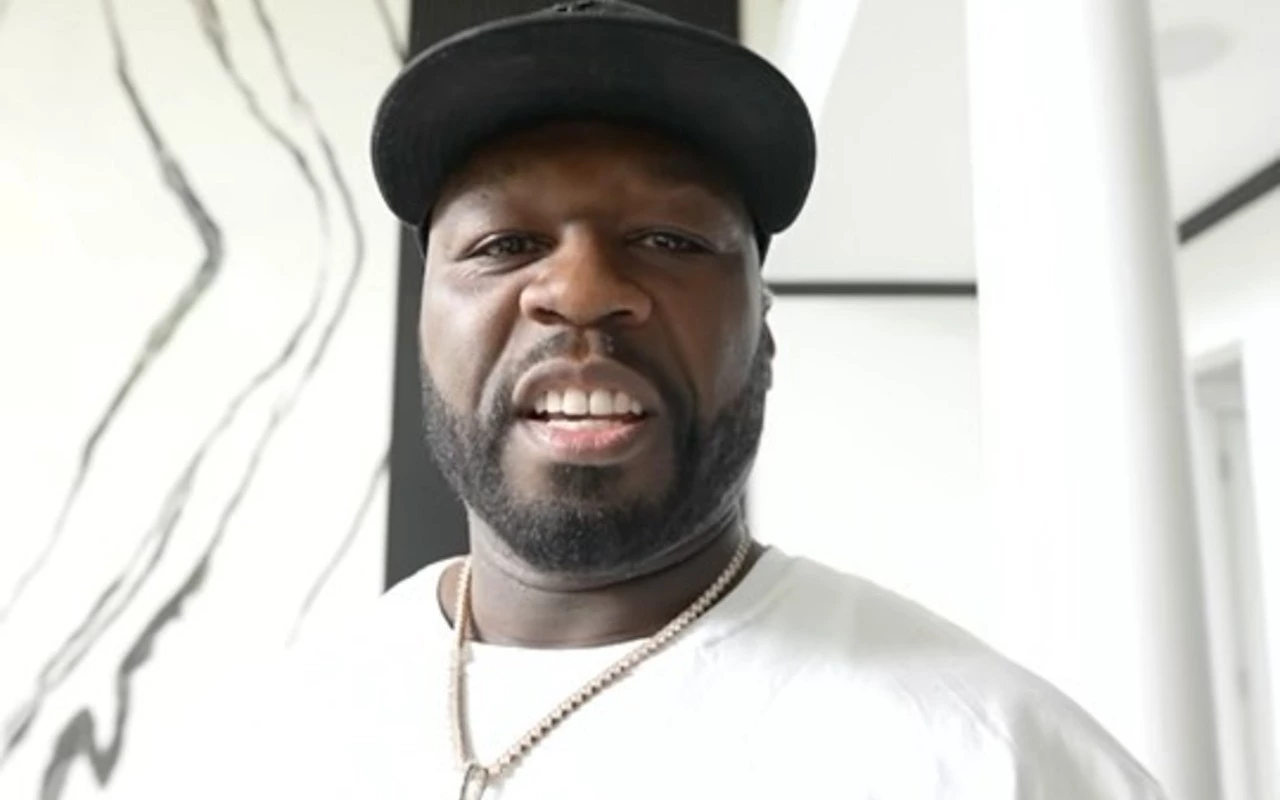 50 Cent Denies 'Intentionally' Hitting Fan by Hurling Microphone Into Crowd