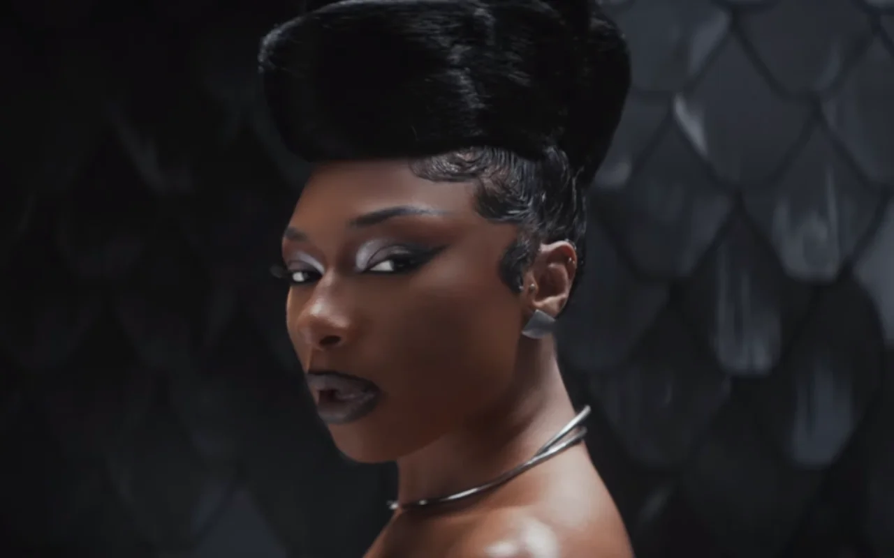 Megan Thee Stallion Crawls Out of Snake's Mouth in 'Cobra' Music Video