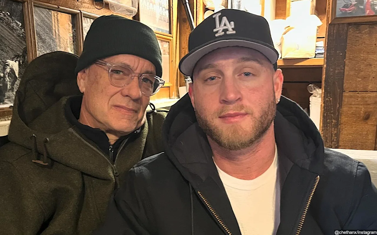 Tom Hanks Matches With Son Chet in Hoodies for Rare Photo After Christmas