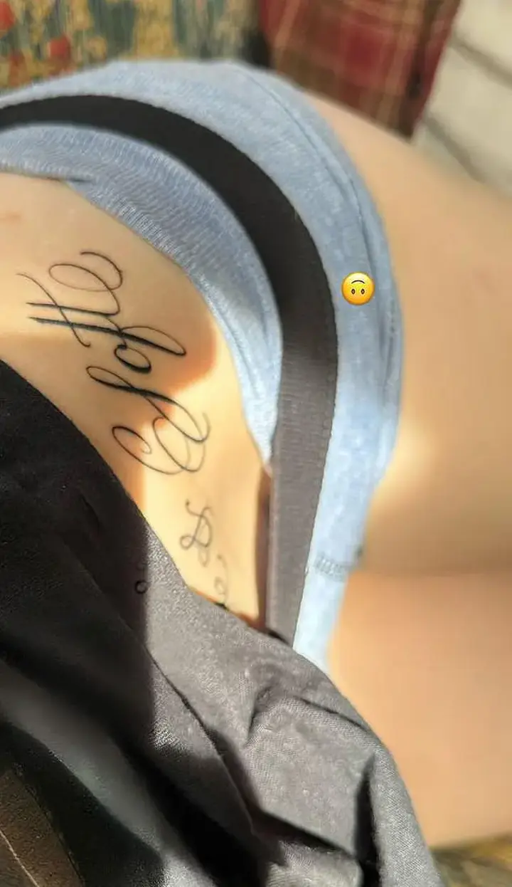 Billie Eilish flaunts her hip tattoo