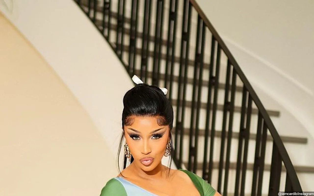 Cardi B Slammed for 'Showing Off Like' Adult Film Star After Posing in Steamy Schoolgirl Outfit
