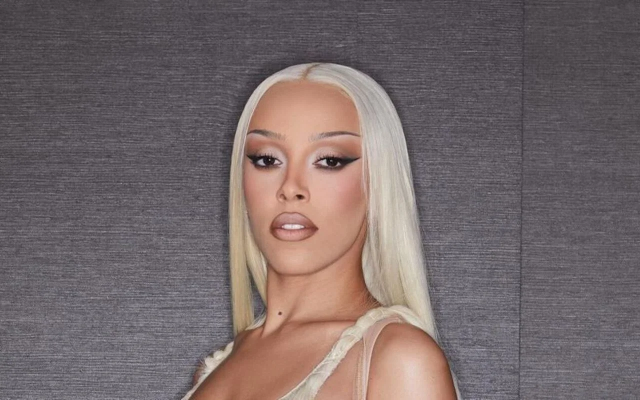 Doja Cat Cracks Fans Up After Arriving at 2024 Met Gala in Nothing But a Towel