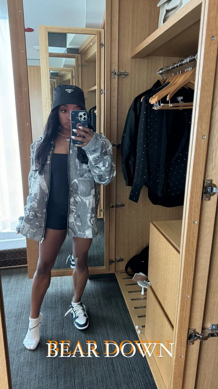Simone Biles wears Packers jacket while cheering on Bears