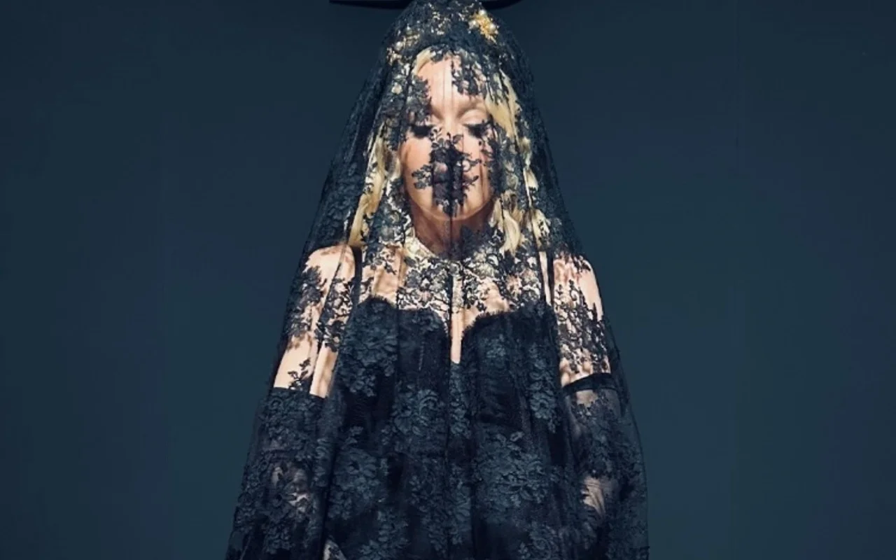 Madonna Covered Up From Head to Toe in Black Veil at Dolce and Gabbana Show  in Milan