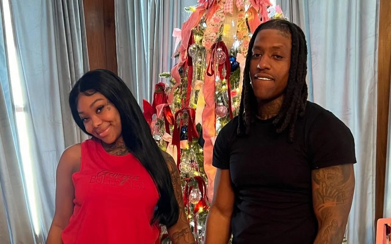 Summer Walker Cuddles New Boyfriend Rico Recklezz in Front of Christmas Tree
