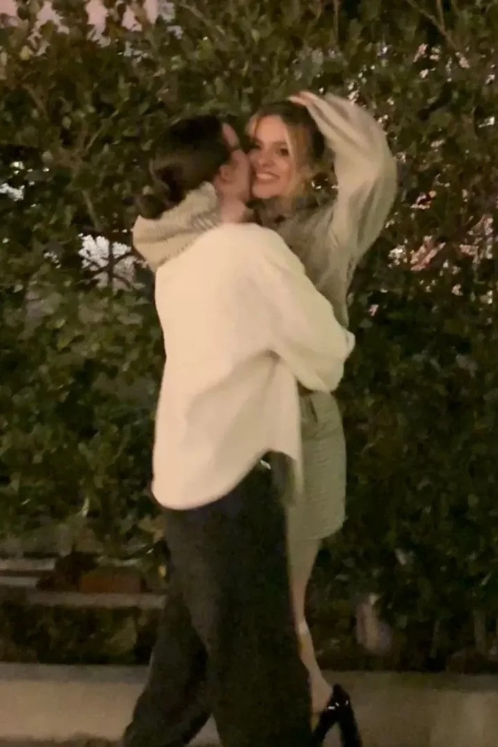 Bella Ramsey and Maisy Stella hugging