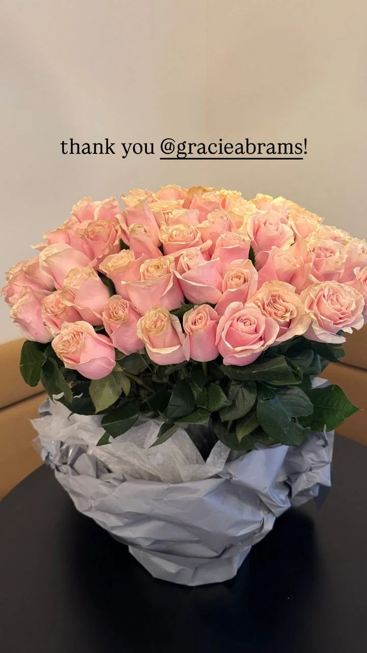 Selena Gomez gets a bouquet of flowers from Gracie Abrams