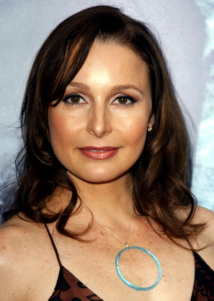 Elle Travis;<br>